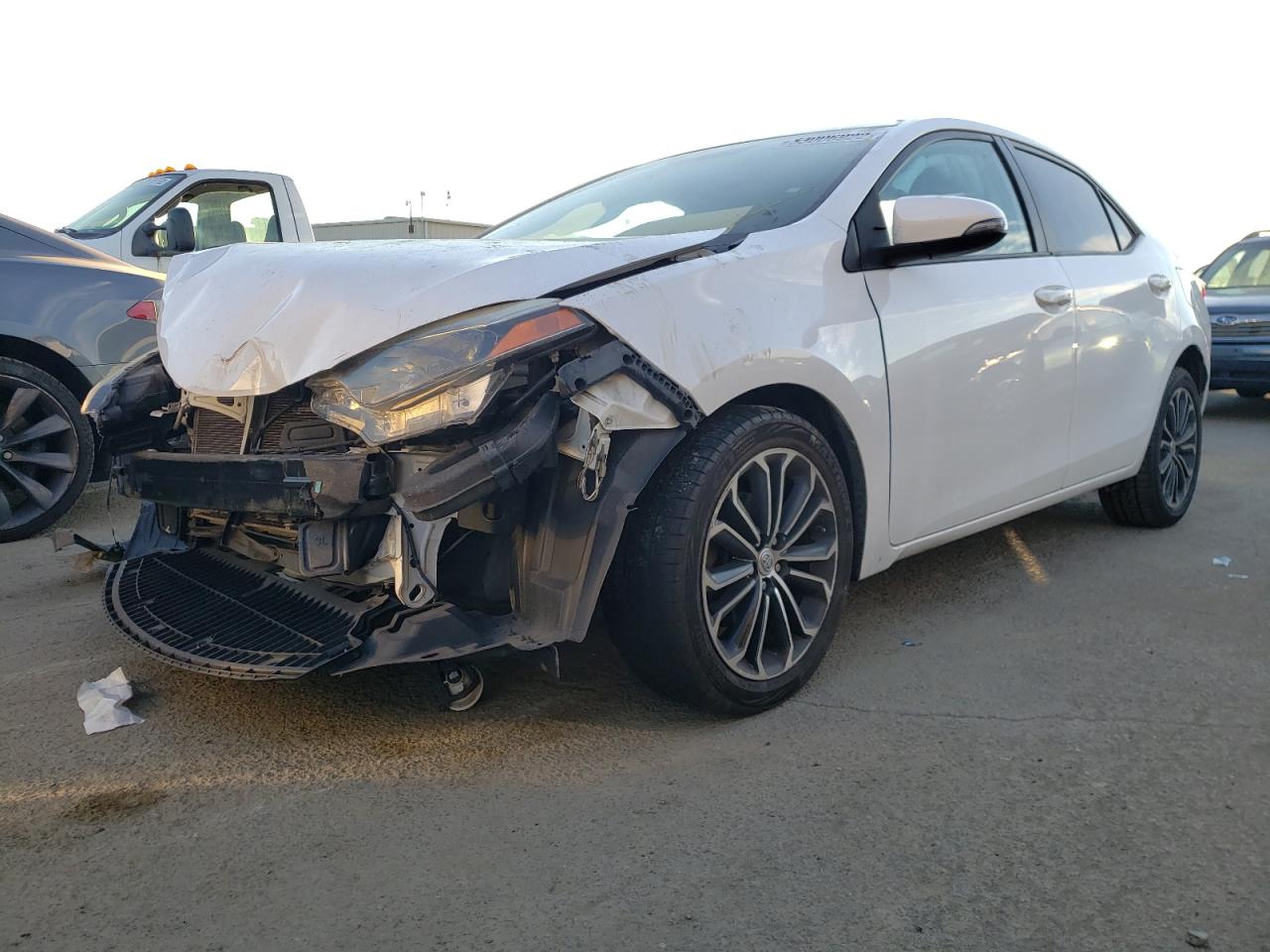 Photo 2 from auction – 2014 TOYOTA COROLLA L with VIN 2T1BURHE8EC064222