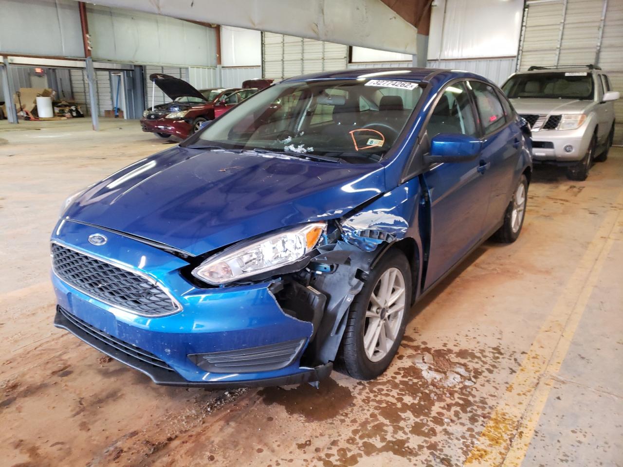 Photo 2 from auction – 2018 FORD FOCUS SE with VIN 1FADP3F26JL212611