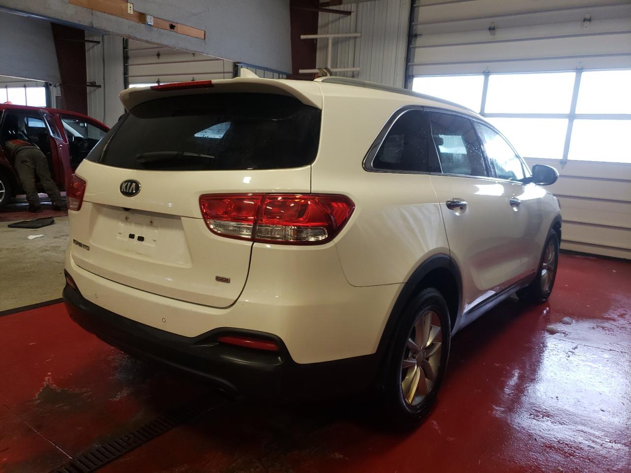 Photo 4 from auction – 2016 KIA SORENTO LX with VIN 5XYPGDA30GG053280