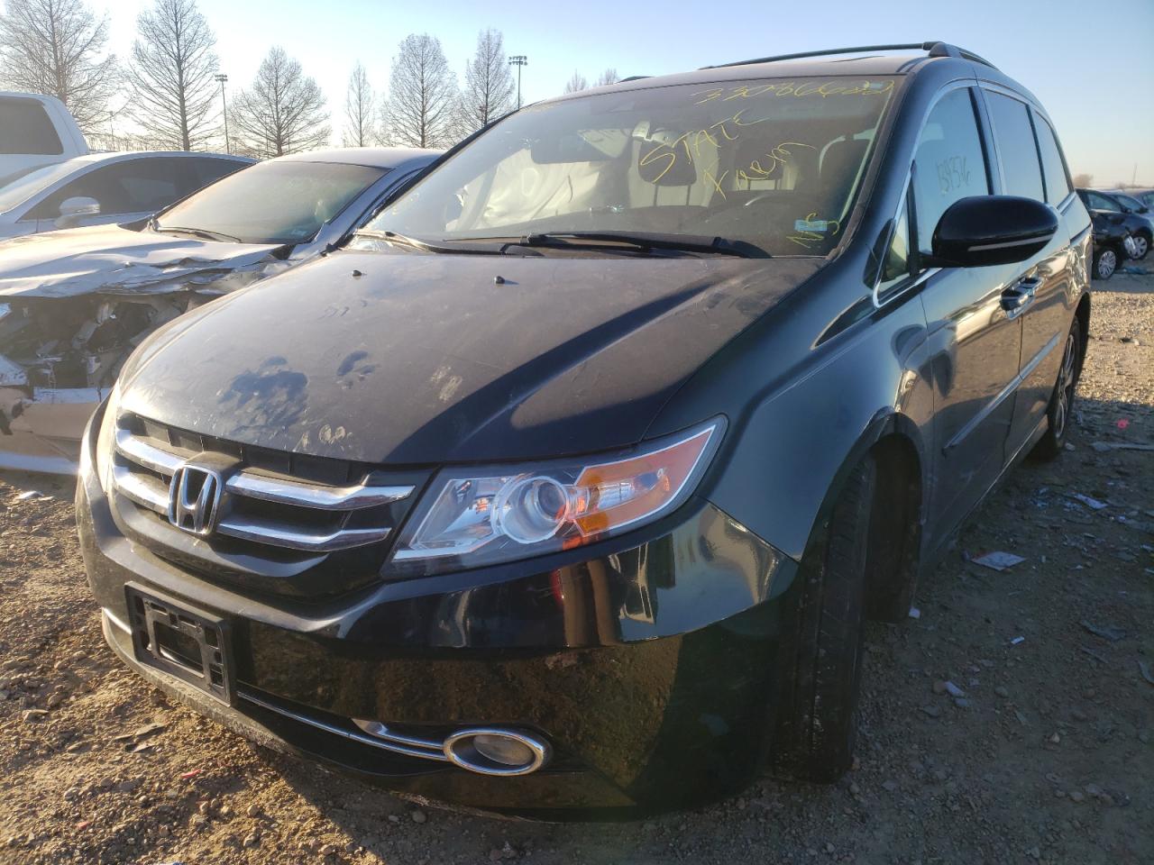 Photo 2 from auction – 2014 HONDA ODYSSEY TO with VIN 5FNRL5H96EB089788
