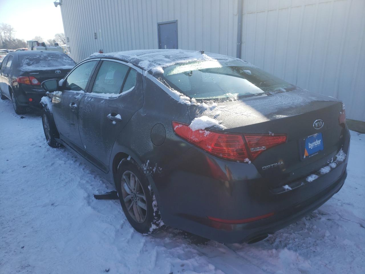 Photo 15 from auction – 2011 KIA OPTIMA LX with VIN KNAGM4A72B5108452