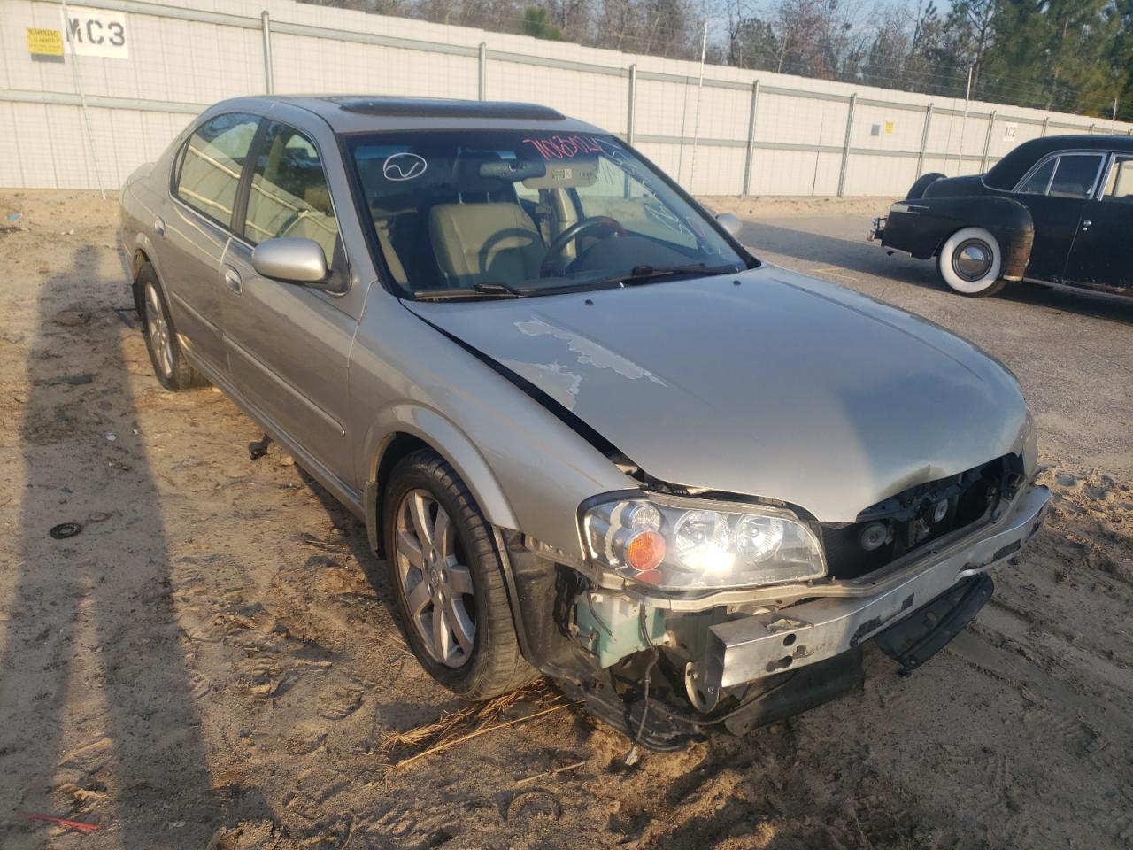 NISSAN MAXIMA GLE 2002 with VIN JN1DA31AX2T303279 - Photo from auction