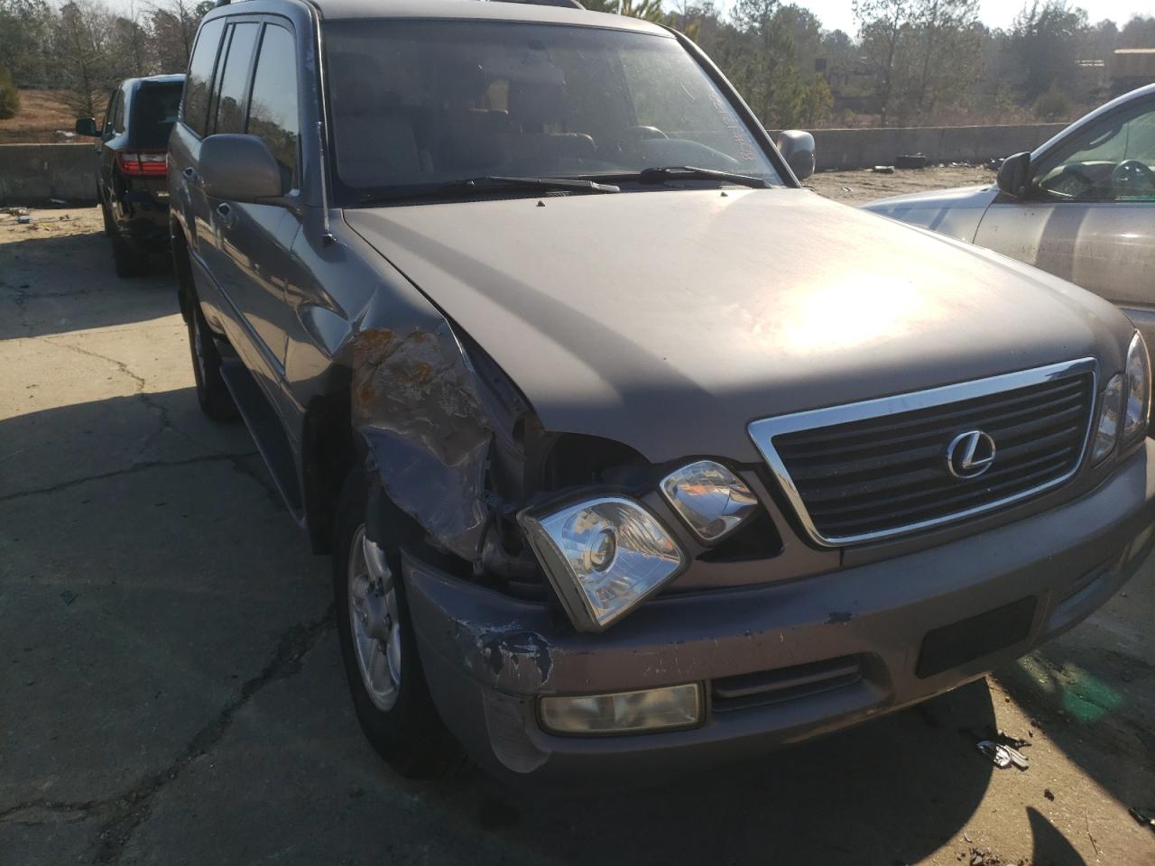 Photo 13 from auction – 2000 LEXUS LX 470 with VIN JT6HT00W7Y0099689