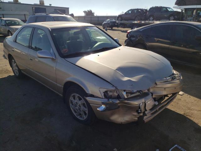 TOYOTA CAMRY 1999 with VIN JT2BF22K6X0158931 - Photo from auction