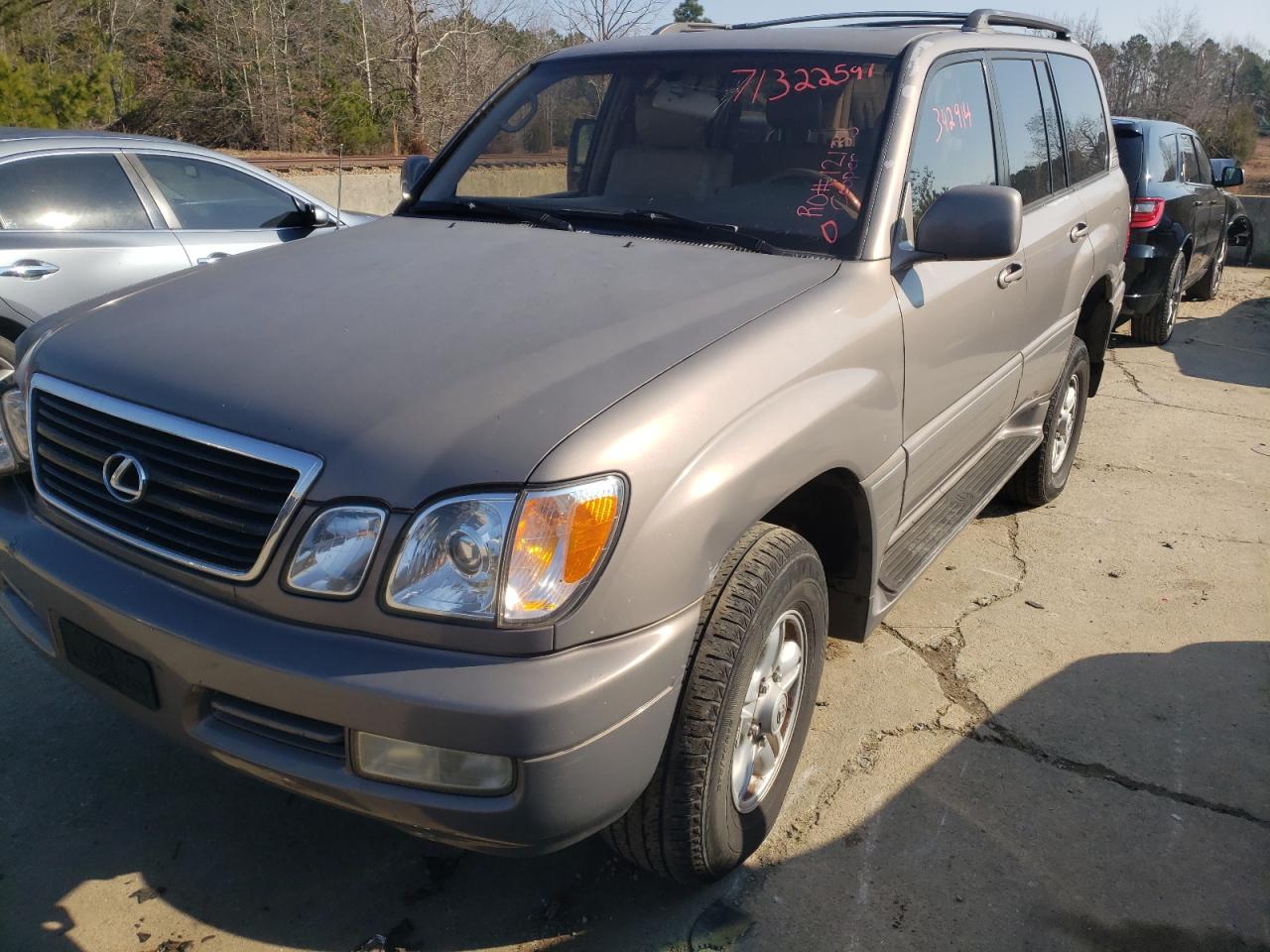 Photo 14 from auction – 2000 LEXUS LX 470 with VIN JT6HT00W7Y0099689
