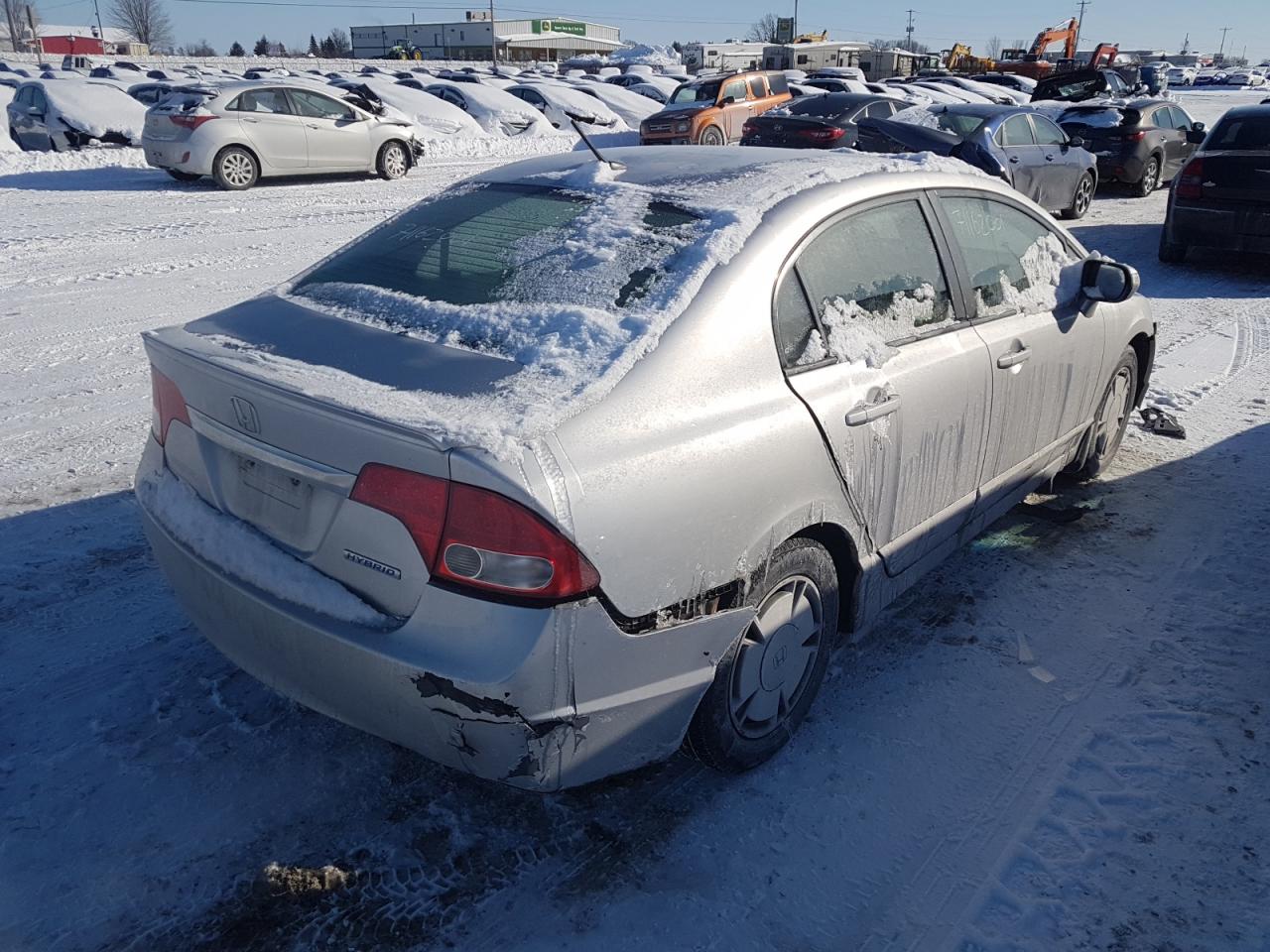 Photo 4 from auction – 2009 HONDA CIVIC HYBR with VIN JHMFA36259S800293