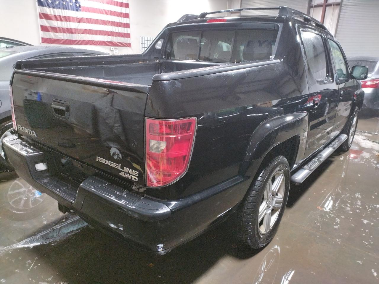 Photo 4 from auction – 2010 HONDA RIDGELINE with VIN 5FPYK1F57AB007785