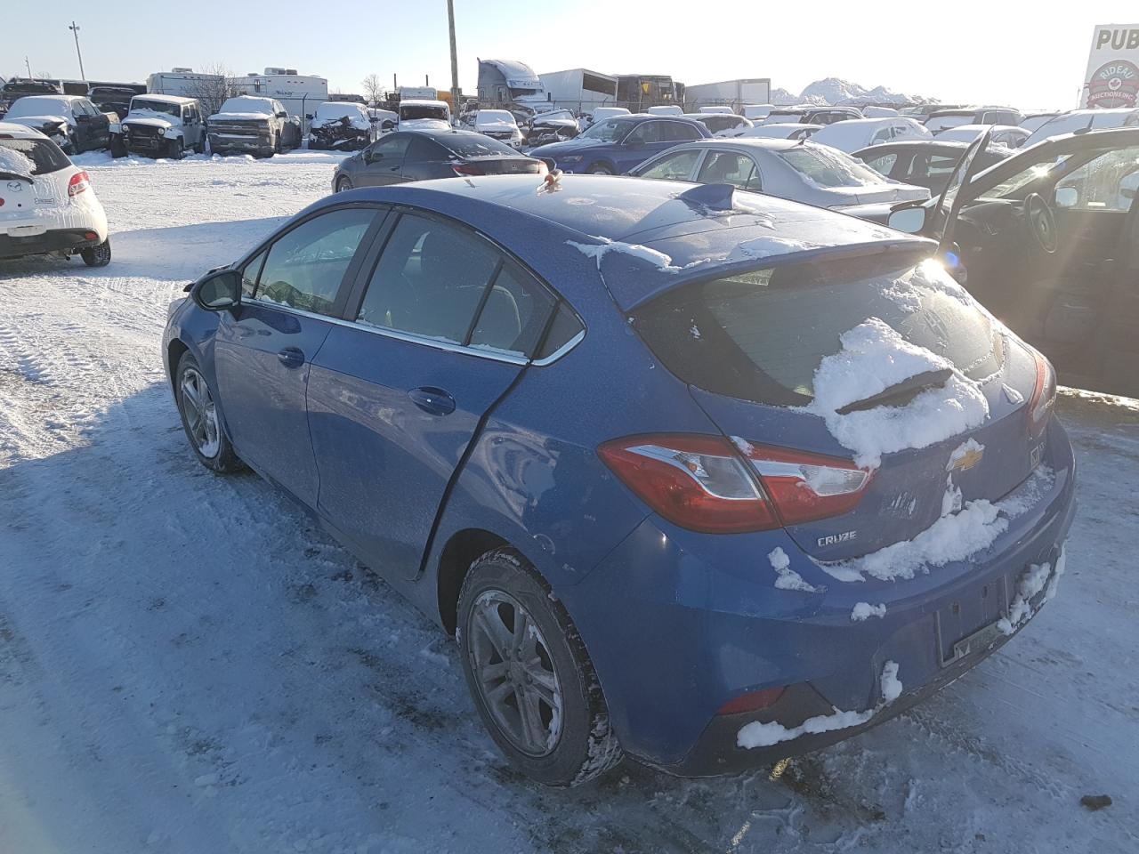 Photo 3 from auction – 2018 CHEVROLET CRUZE LT with VIN 3G1BE6SM2JS555001