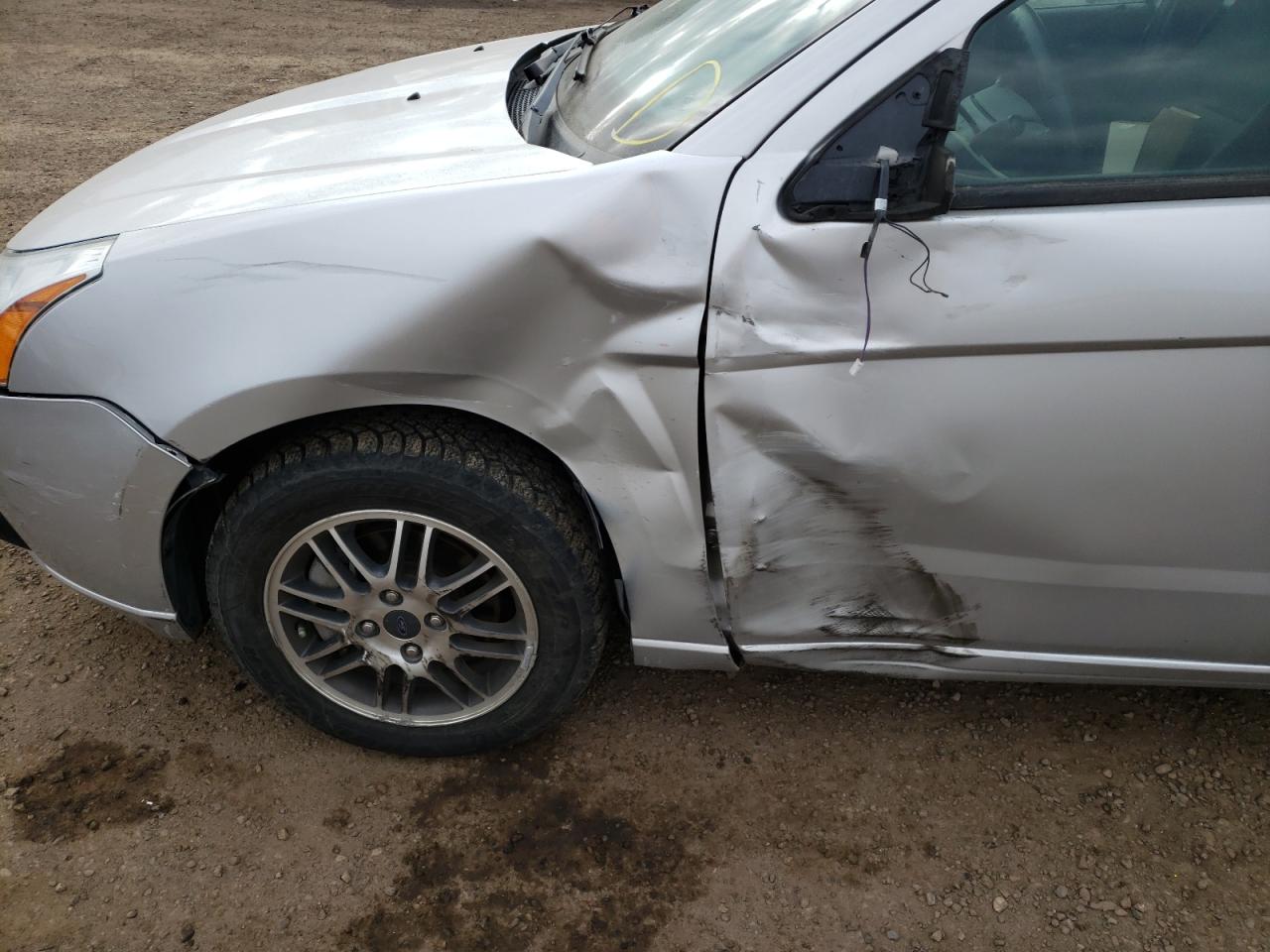 Photo 9 from auction – 2011 FORD FOCUS SE with VIN 1FAHP3FNXBW131560