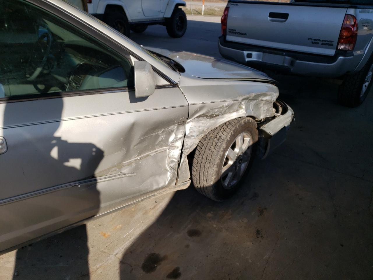 Photo 9 from auction – 2002 TOYOTA AVALON XL with VIN 4T1BF28B72U218128