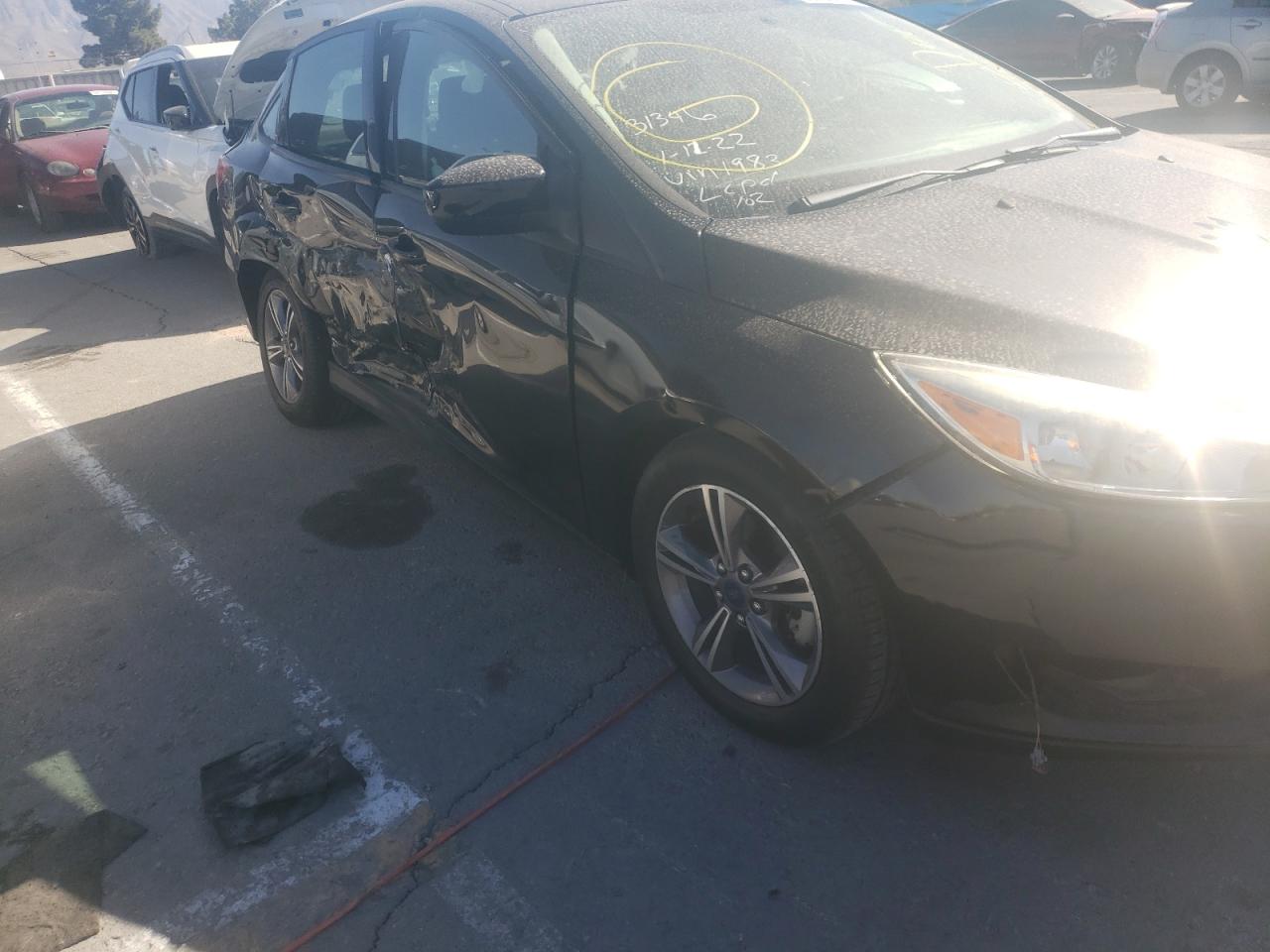 Photo 9 from auction – 2018 FORD FOCUS SE with VIN 1FADP3FE5JL259283