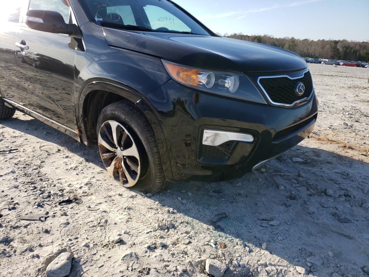 Photo 9 from auction – 2011 KIA SORENTO SX with VIN 5XYKW4A25BG093559