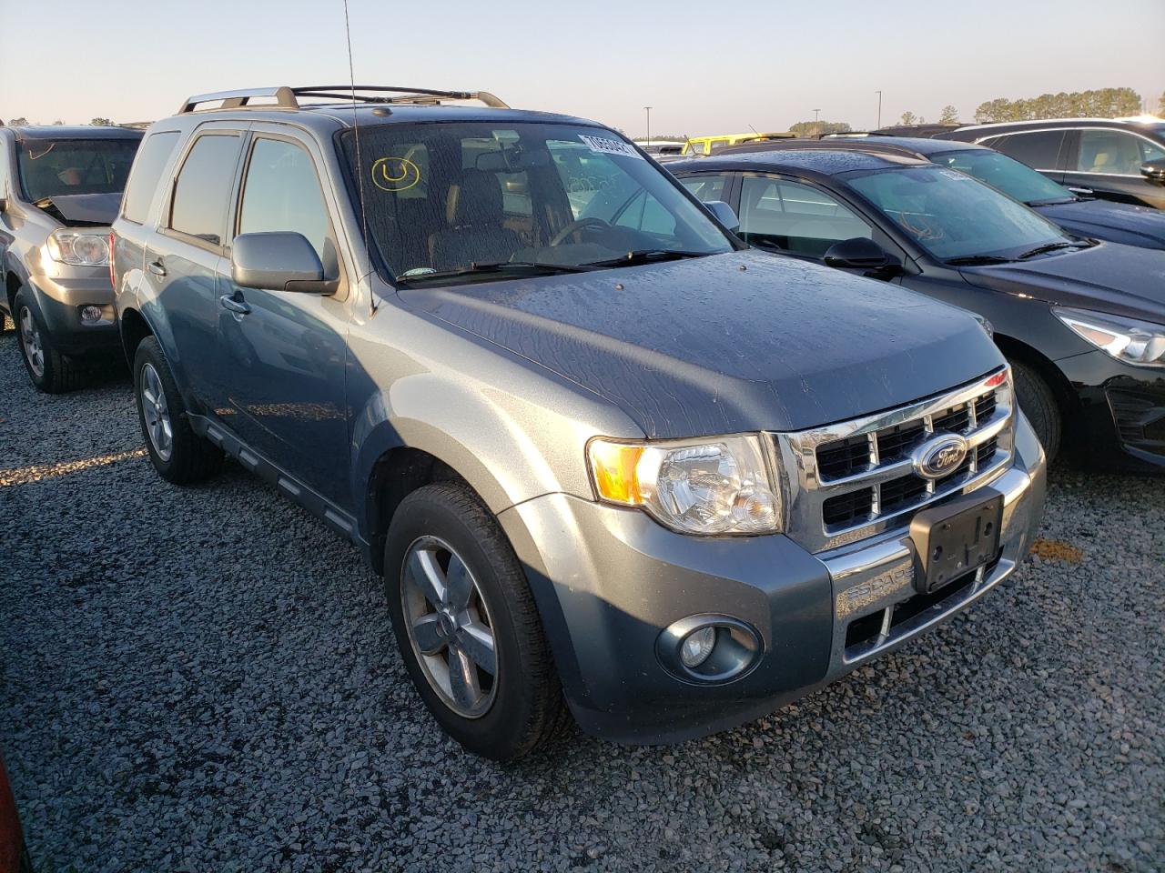 FORD ESCAPE LIM 2011 with VIN 1FMCU9EG4BKC51702 - Photo from auction