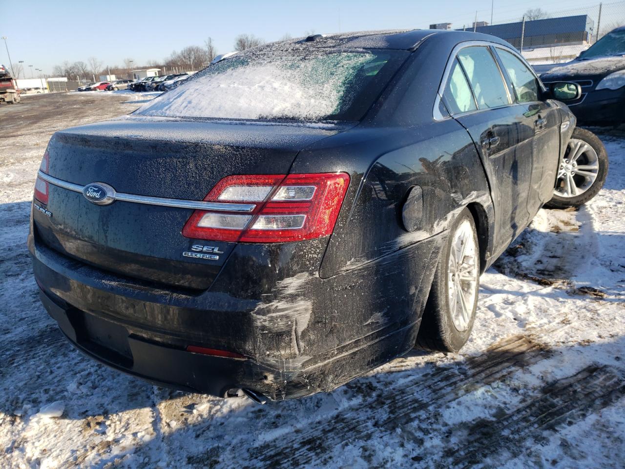 Photo 4 from auction – 2015 FORD TAURUS SEL with VIN 1FAHP2E89FG152390