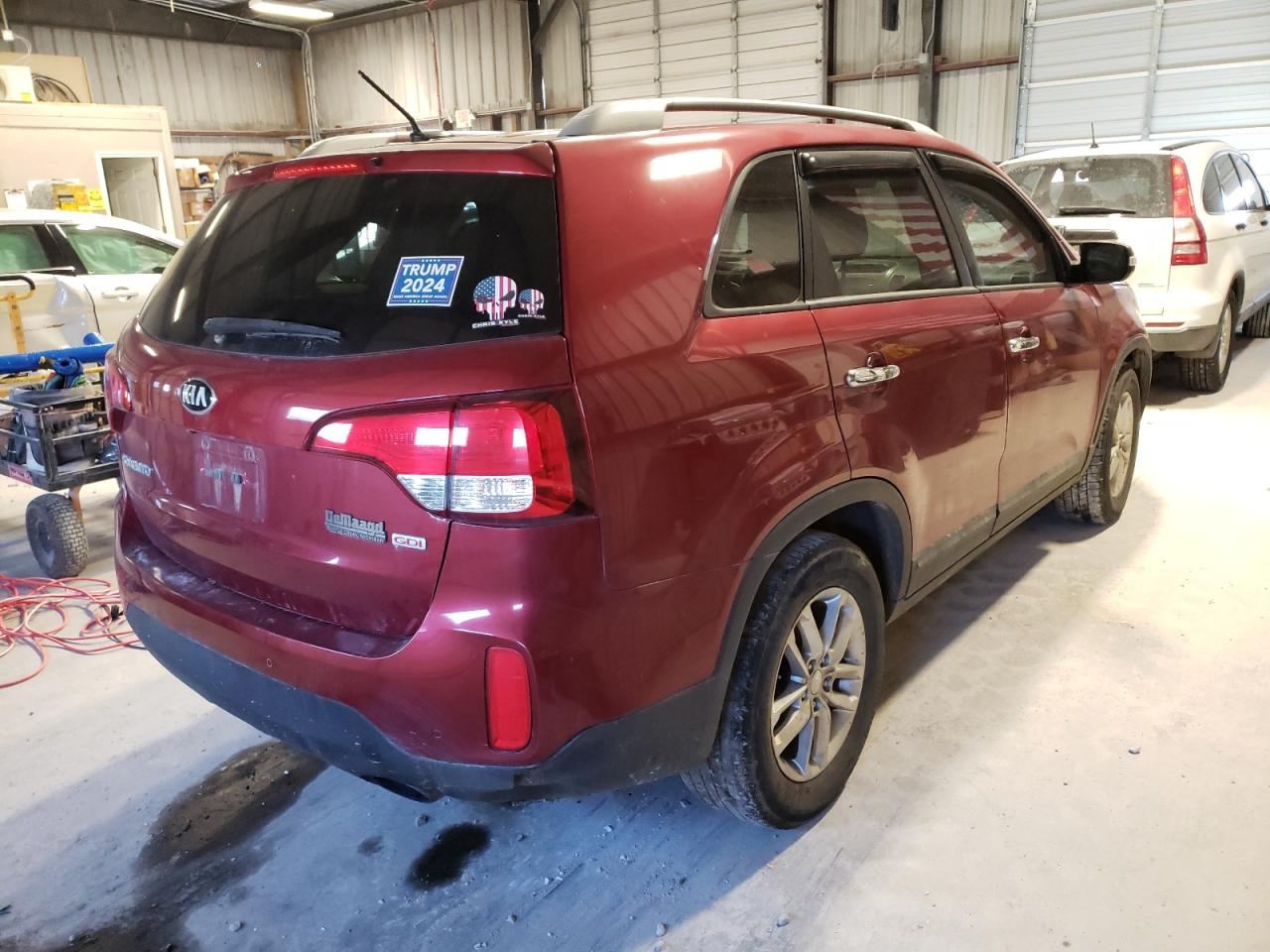 Photo 4 from auction – 2015 KIA SORENTO LX with VIN 5XYKT4A63FG577408