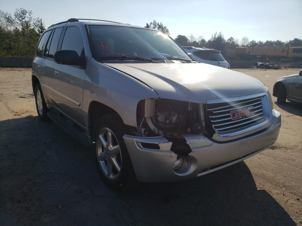 GMC ENVOY 2007 with VIN 1GKDT13S472246421 - Photo from auction