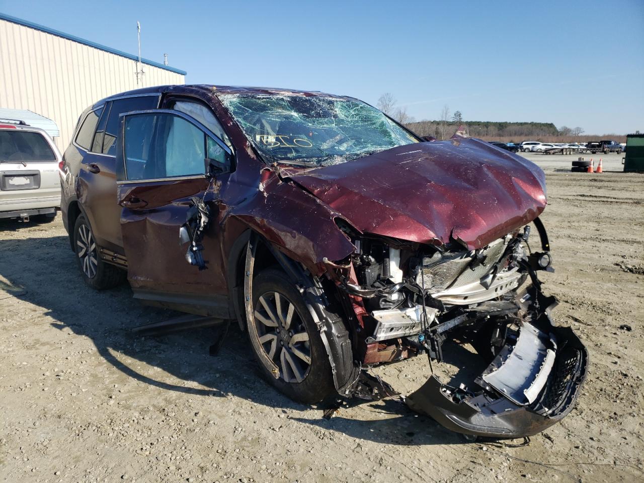 HONDA PILOT EXL 2021 with VIN 5FNYF5H55MB010772 - Photo from auction
