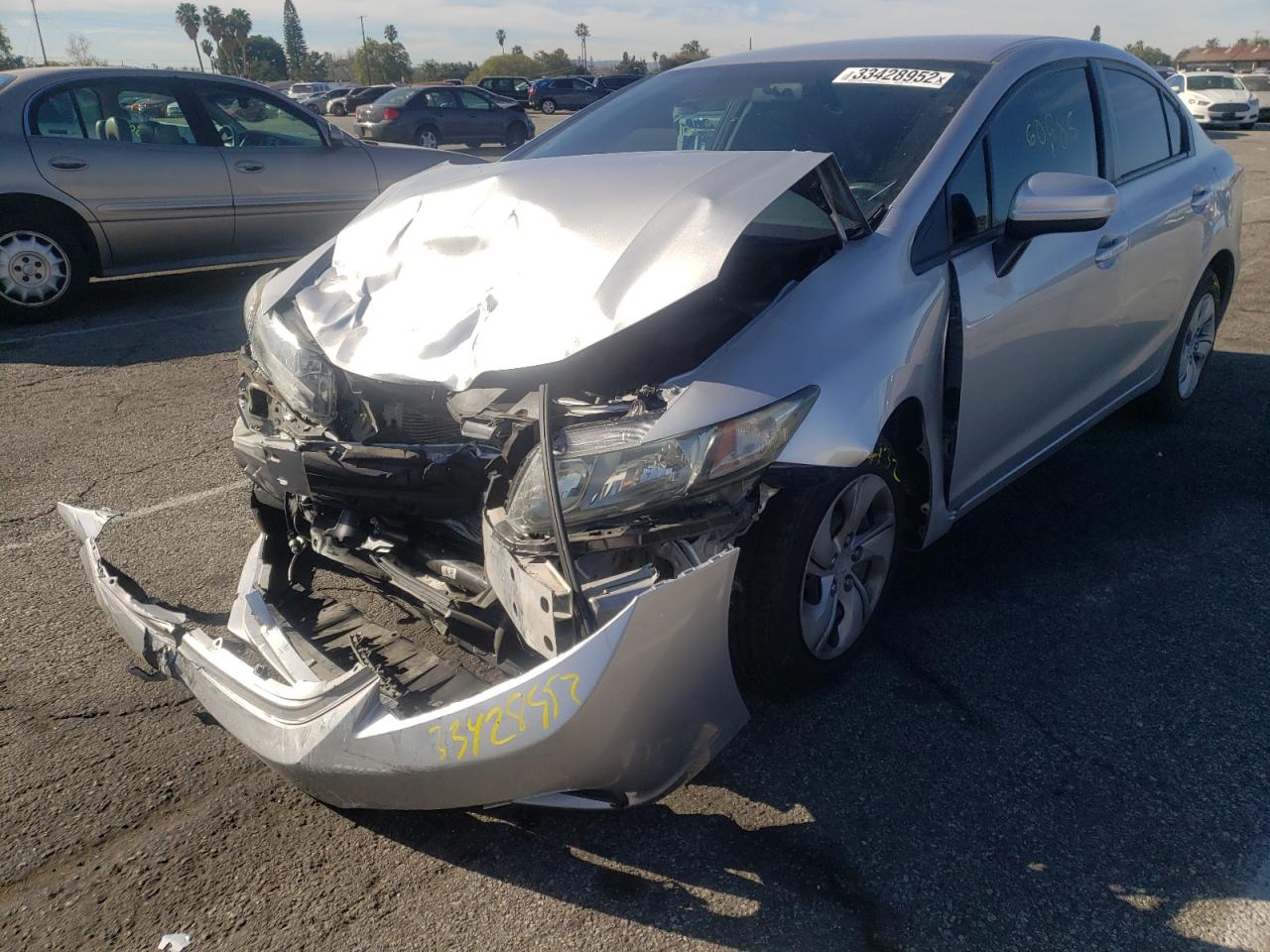 Photo 2 from auction – 2014 HONDA CIVIC LX with VIN 19XFB2F52EE267383