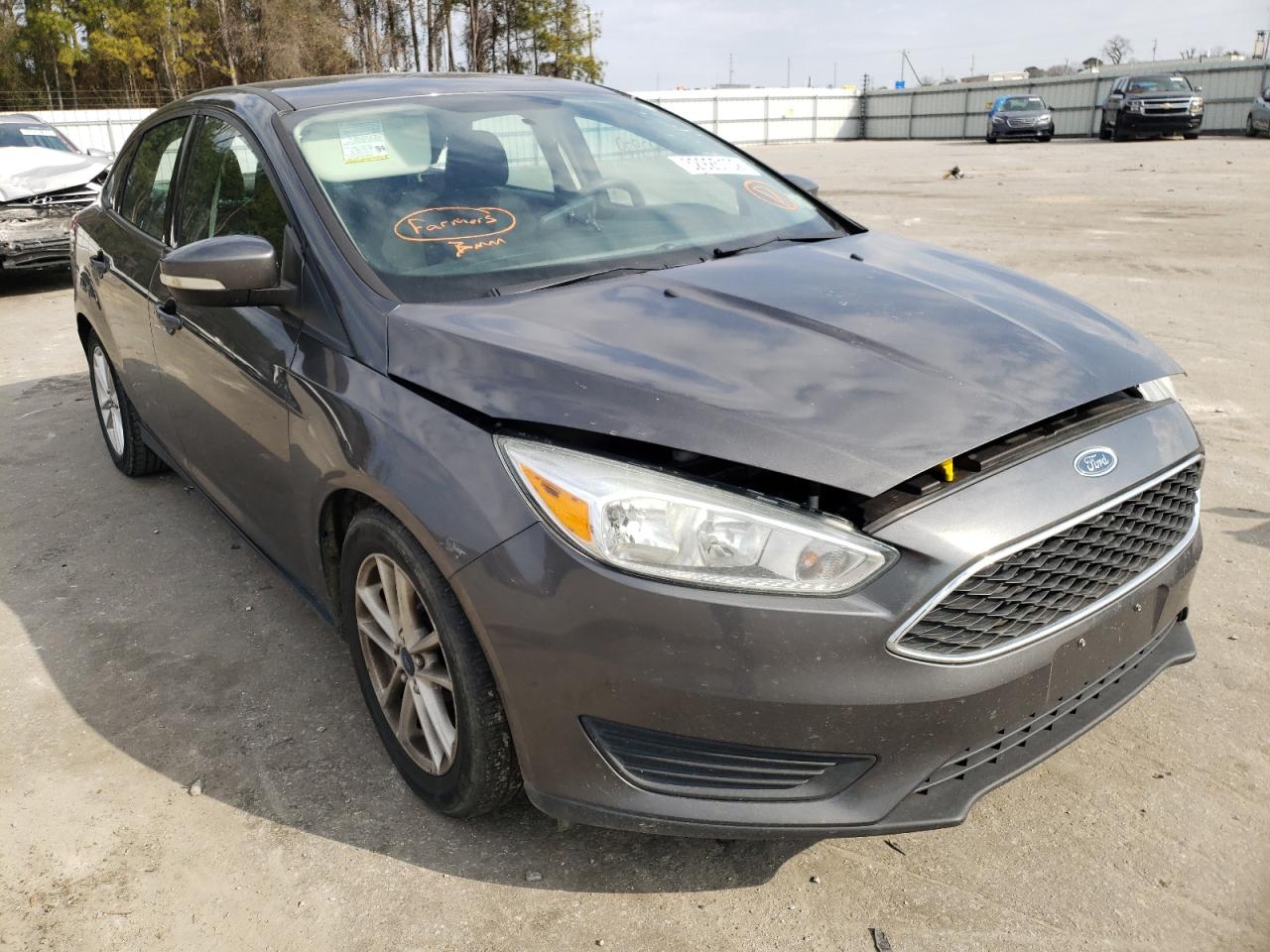 FORD FOCUS SE 2015 with VIN 1FADP3F22FL330422 - Photo from auction