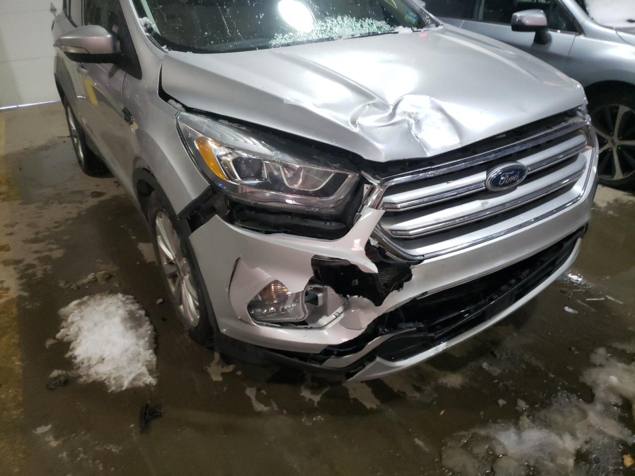 Photo 9 from auction – 2017 FORD ESCAPE TIT with VIN 1FMCU9JD4HUB27700