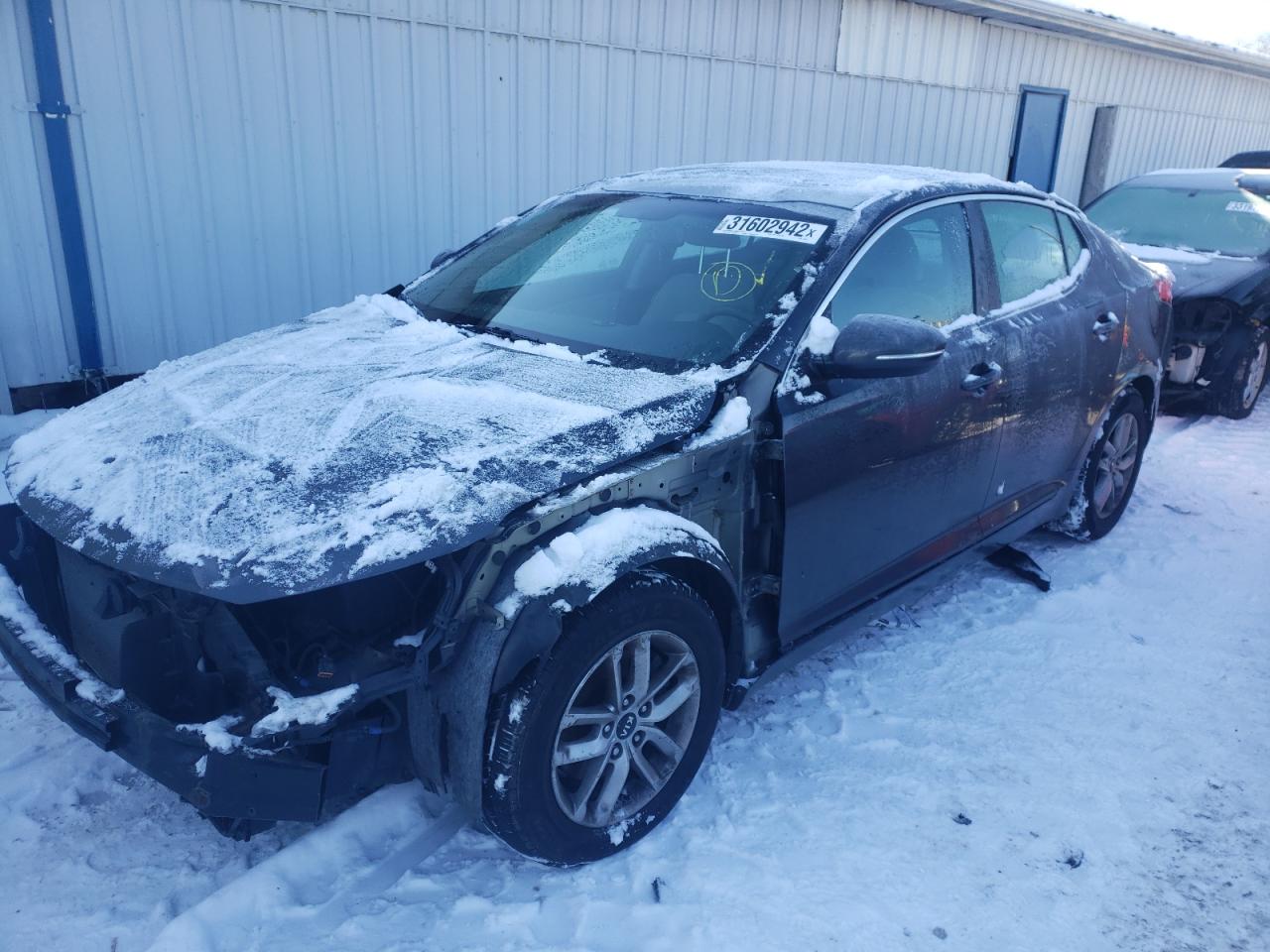 Photo 14 from auction – 2011 KIA OPTIMA LX with VIN KNAGM4A72B5108452