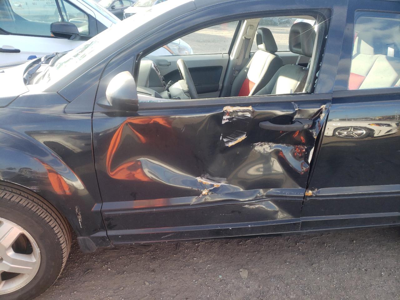 Photo 9 from auction – 2007 DODGE CALIBER SX with VIN 1B3HB48B07D589968