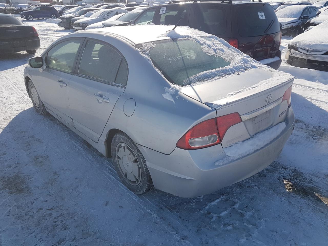 Photo 3 from auction – 2009 HONDA CIVIC HYBR with VIN JHMFA36259S800293