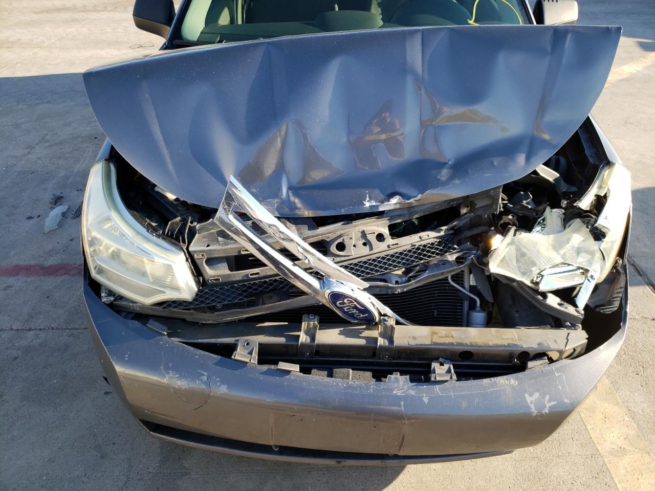 Photo 7 from auction – 2011 FORD FOCUS S with VIN 1FAHP3EN5BW164855