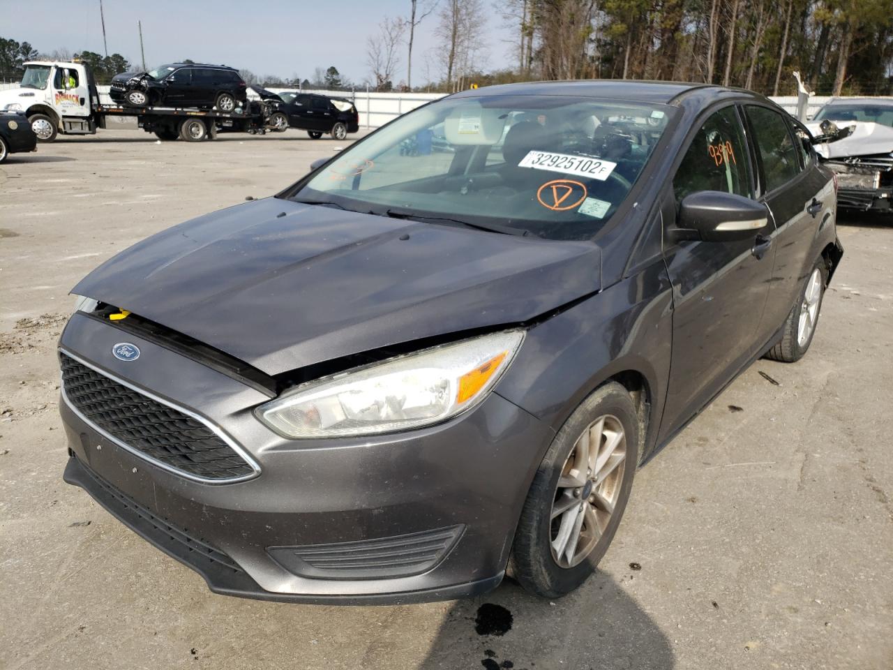 Photo 2 from auction – 2015 FORD FOCUS SE with VIN 1FADP3F22FL330422