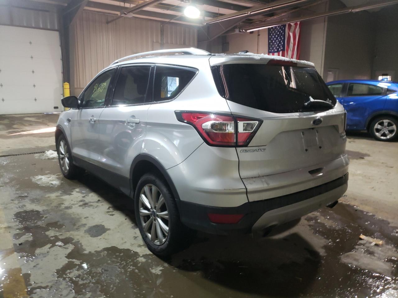 Photo 3 from auction – 2017 FORD ESCAPE TIT with VIN 1FMCU9JD4HUB27700