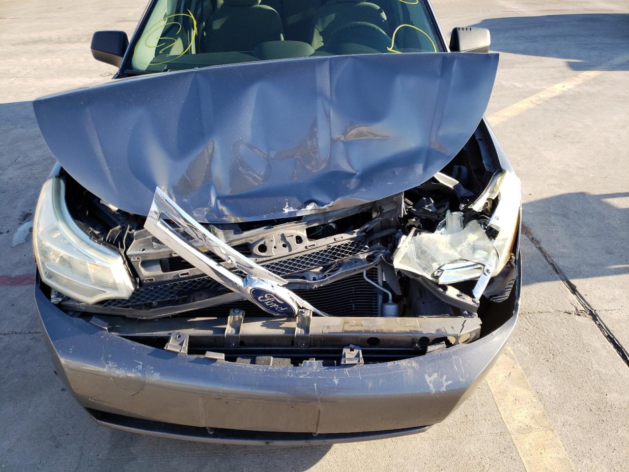 Photo 9 from auction – 2011 FORD FOCUS S with VIN 1FAHP3EN5BW164855