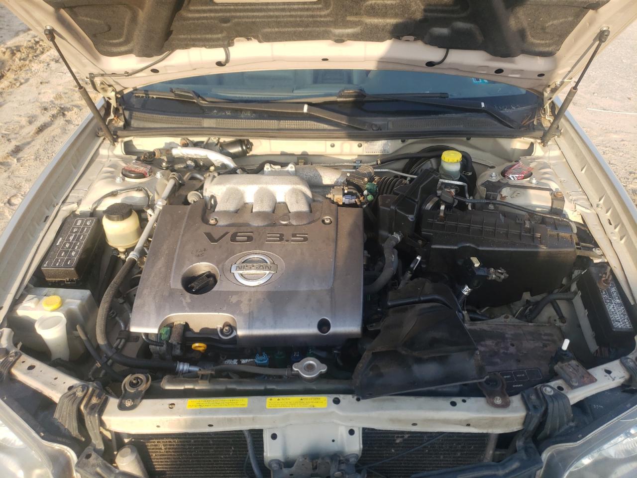 Photo 7 from auction – 2002 NISSAN MAXIMA GLE with VIN JN1DA31AX2T303279