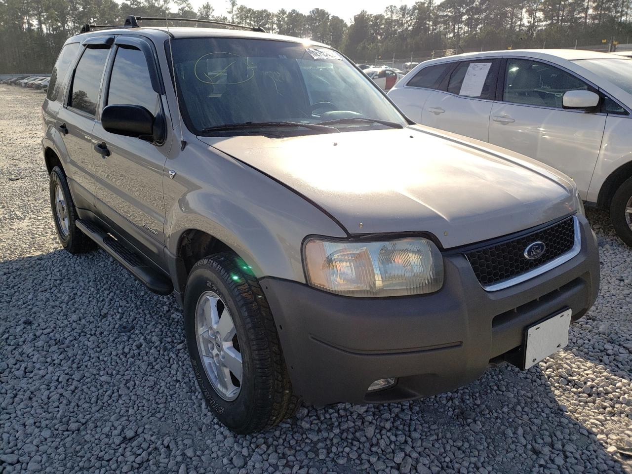 FORD ESCAPE 2001 with VIN 1FMYU01111KA80652 - Photo from auction