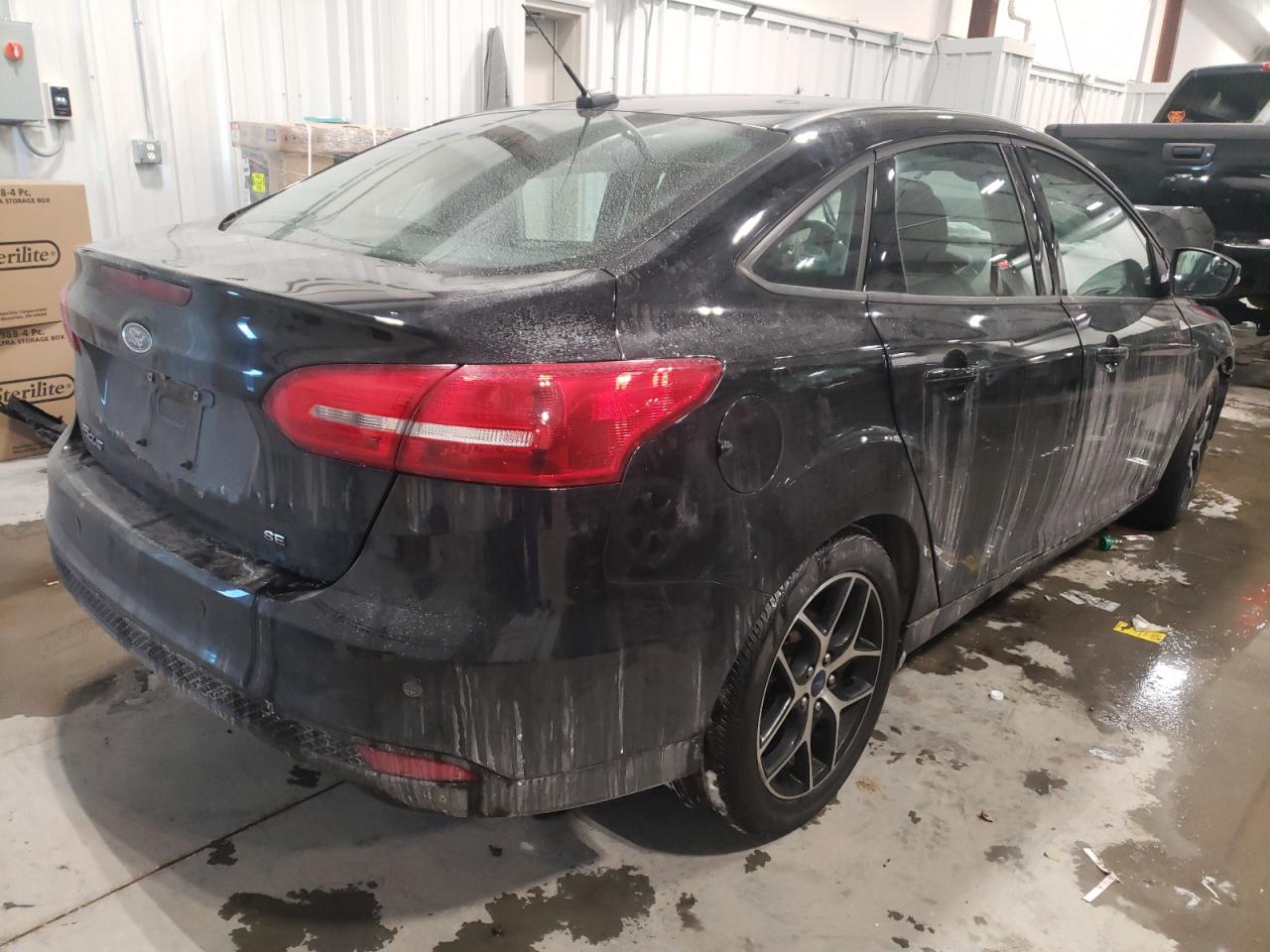 Photo 4 from auction – 2017 FORD FOCUS SEL with VIN 1FADP3H24HL339168