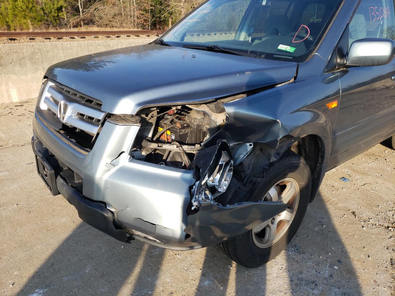 Photo 9 from auction – 2006 HONDA PILOT EX with VIN 2HKYF18446H542907