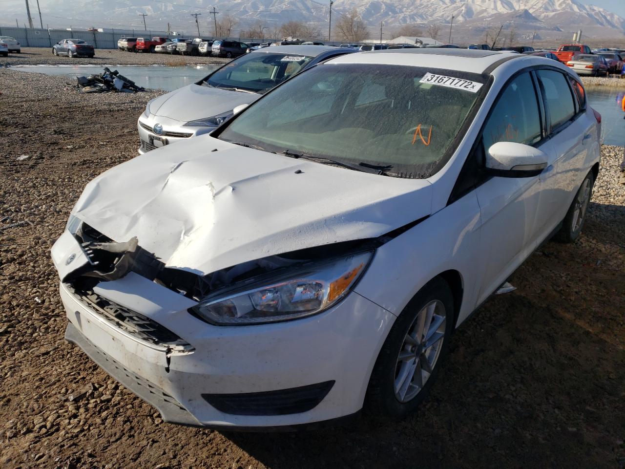Photo 2 from auction – 2016 FORD FOCUS SE with VIN 1FADP3K29GL364204