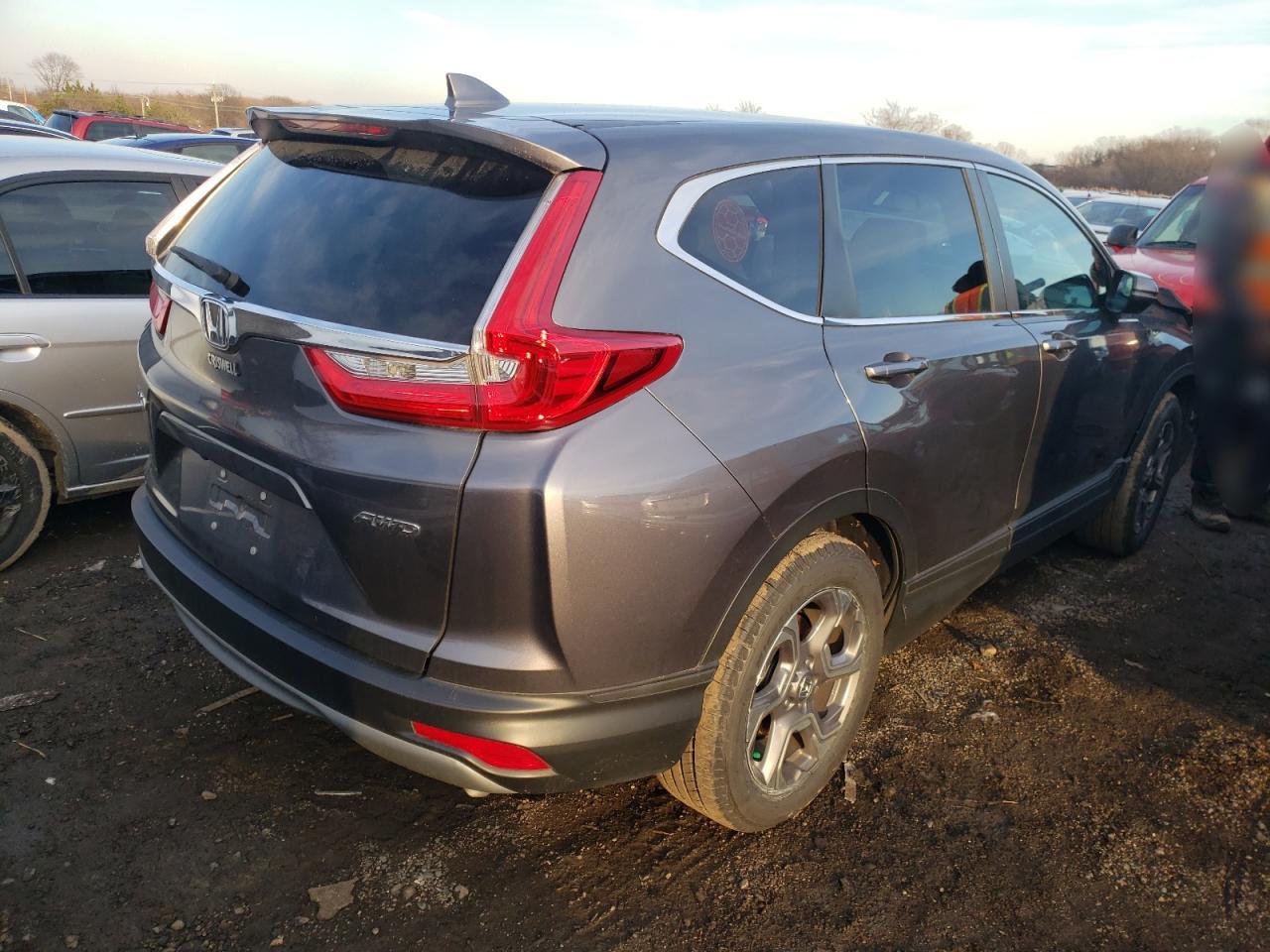 Photo 4 from auction – 2017 HONDA CR-V EXL with VIN 2HKRW2H89HH667983