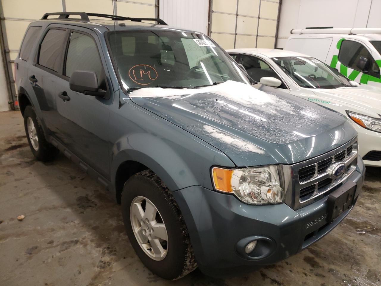 FORD ESCAPE XLT 2011 with VIN 1FMCU0D75BKC51740 - Photo from auction
