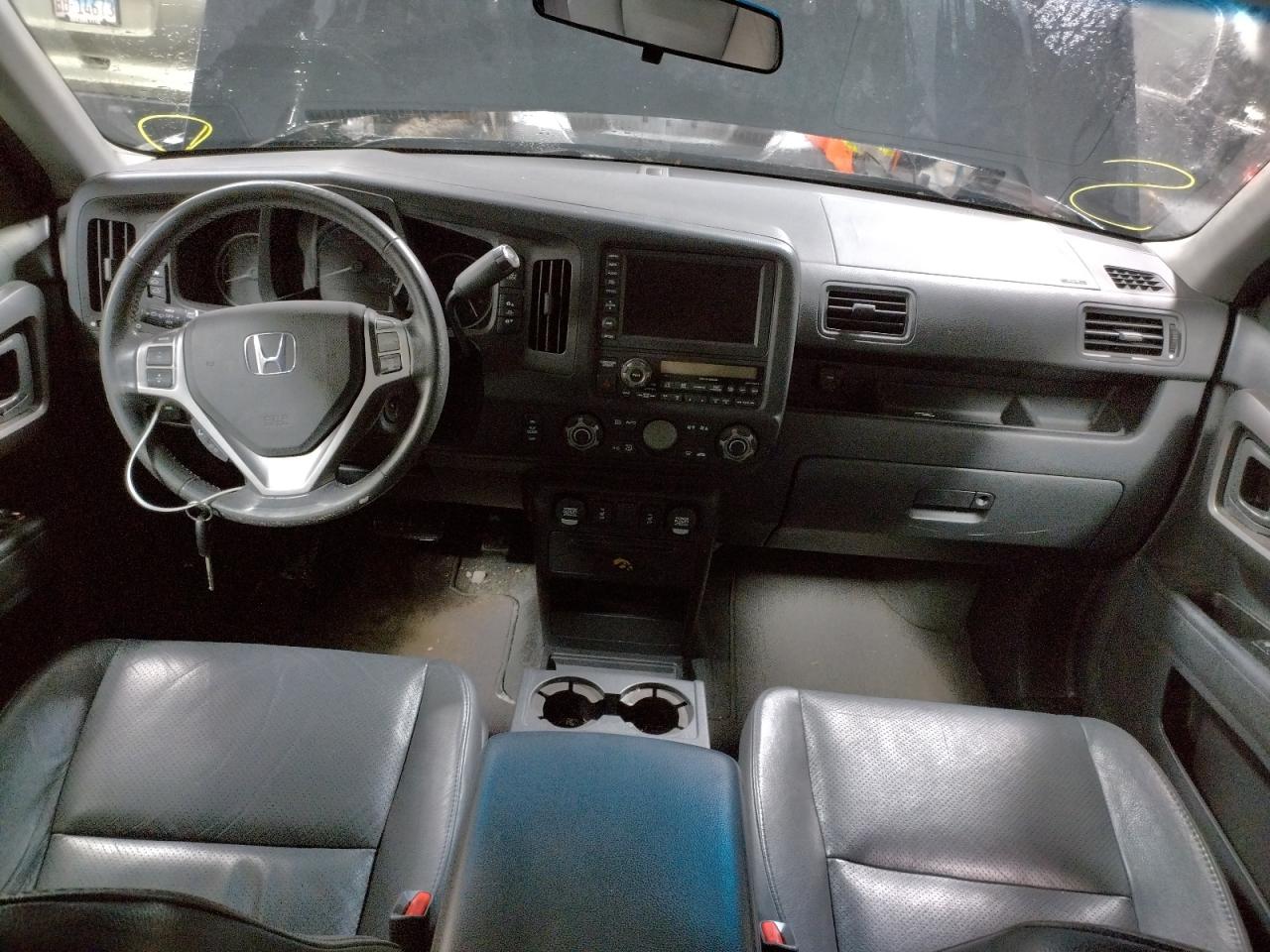 Photo 9 from auction – 2010 HONDA RIDGELINE with VIN 5FPYK1F57AB007785