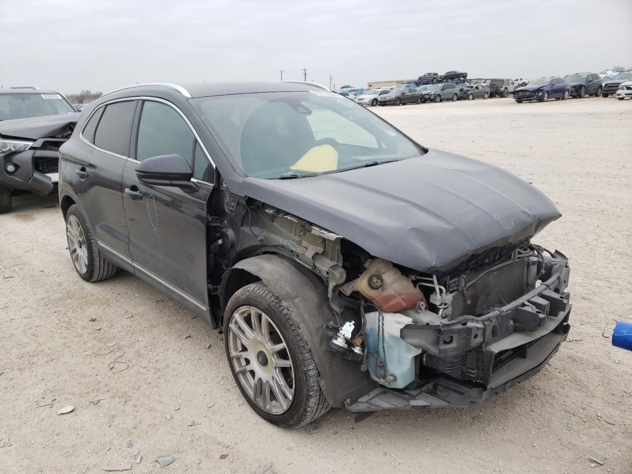 LINCOLN MKC 2015 with VIN 5LMTJ2AH5FUJ39500 - Photo from auction