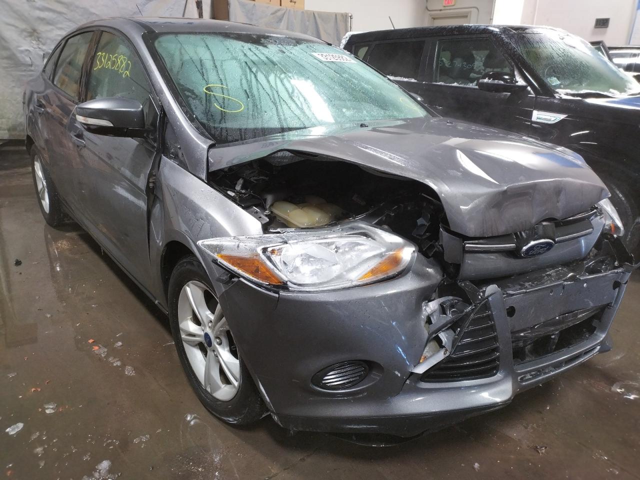 FORD FOCUS SE 2014 with VIN 1FADP3F24EL428012 - Photo from auction