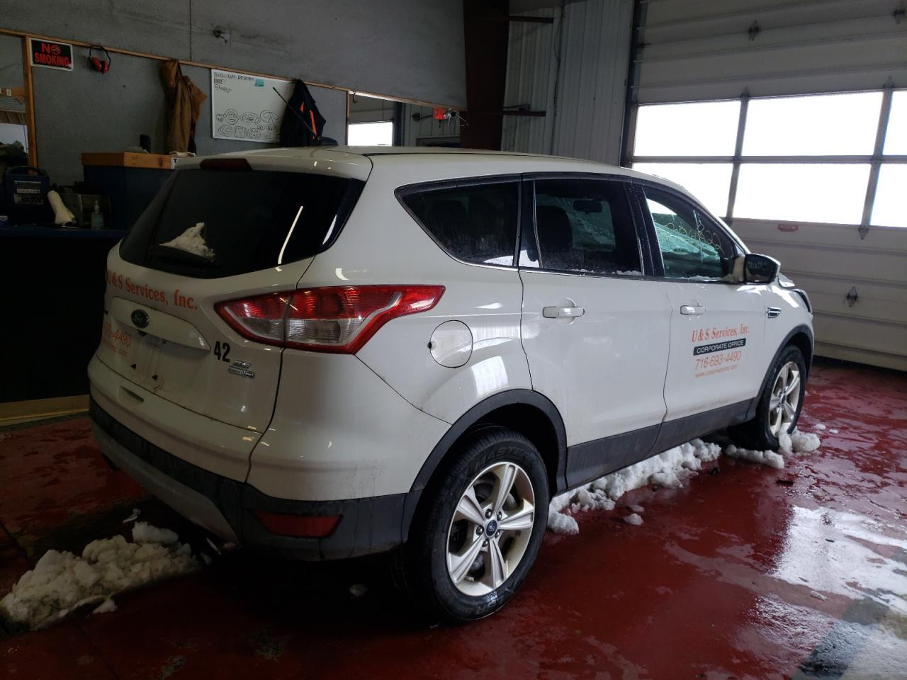 Photo 4 from auction – 2016 FORD ESCAPE SE with VIN 1FMCU9G90GUC66921