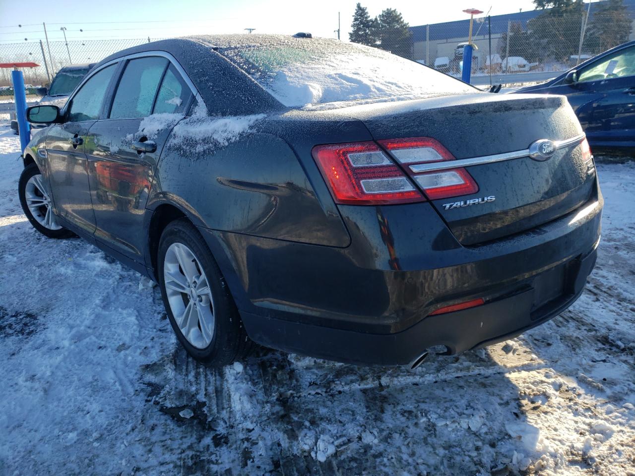 Photo 3 from auction – 2015 FORD TAURUS SEL with VIN 1FAHP2E89FG152390