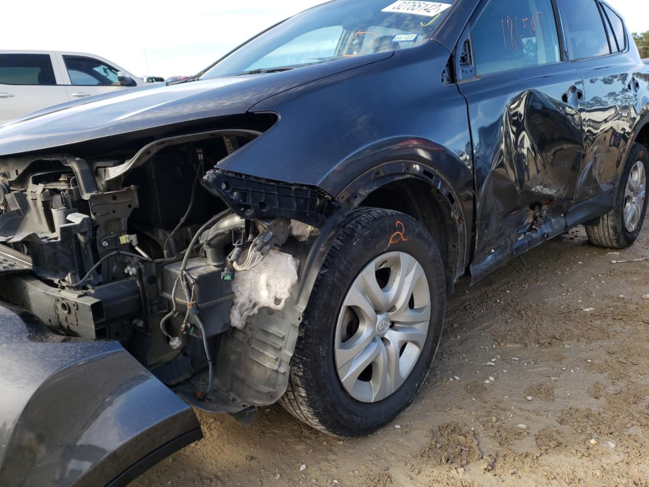 Photo 9 from auction – 2014 TOYOTA RAV4 LE with VIN 2T3ZFREV4EW100149