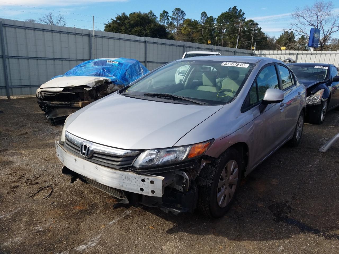 Photo 2 from auction – 2012 HONDA CIVIC LX with VIN 19XFB2F50CE068832