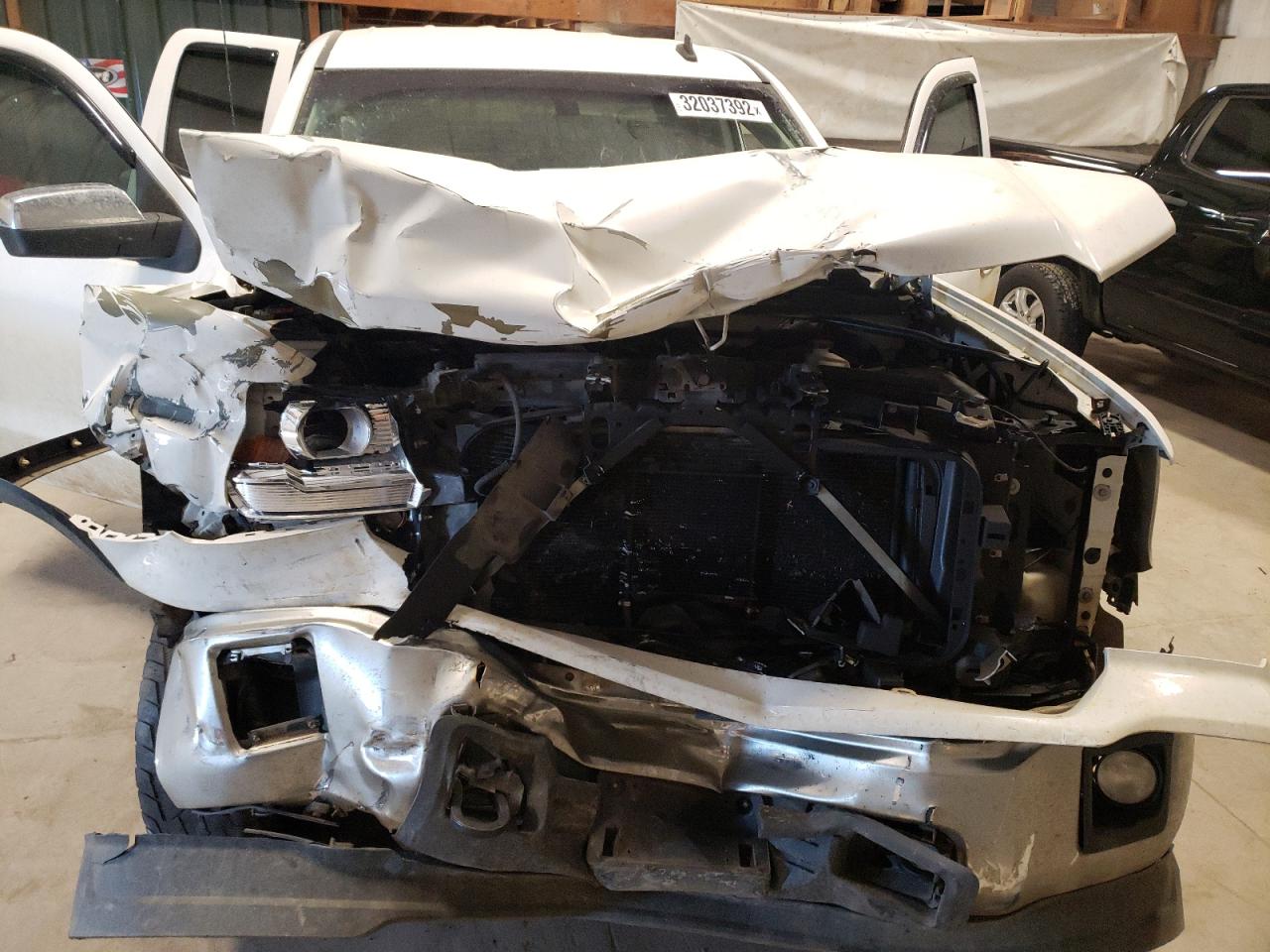 Photo 9 from auction – 2014 GMC SIERRA K15 with VIN 1GTV2TEC1EZ300590