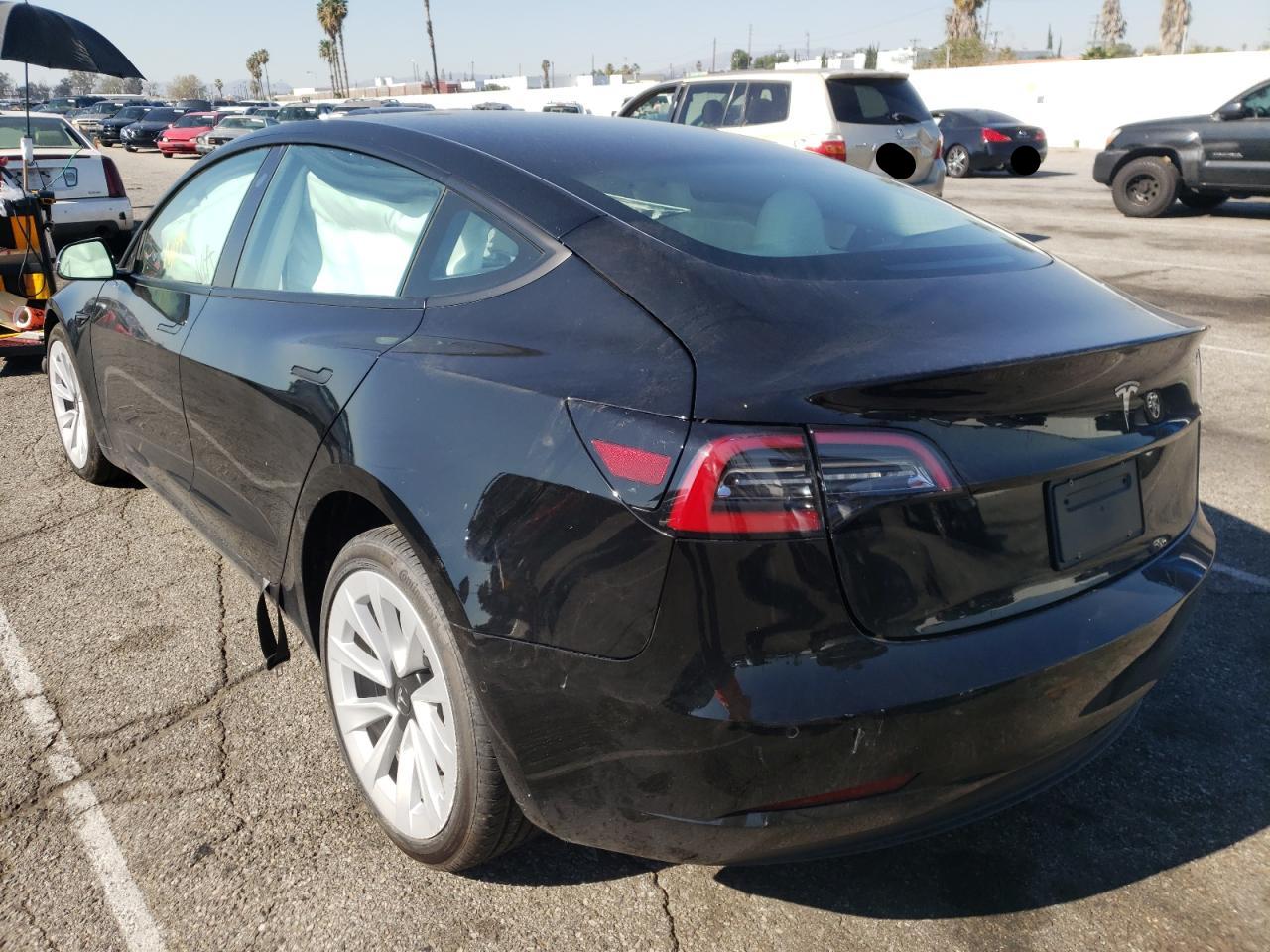 Photo 3 from auction – 2021 TESLA MODEL 3 with VIN 5YJ3E1EA9MF994337
