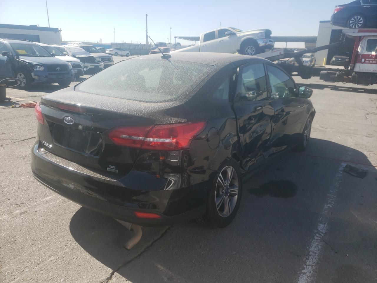 Photo 4 from auction – 2018 FORD FOCUS SE with VIN 1FADP3FE5JL259283