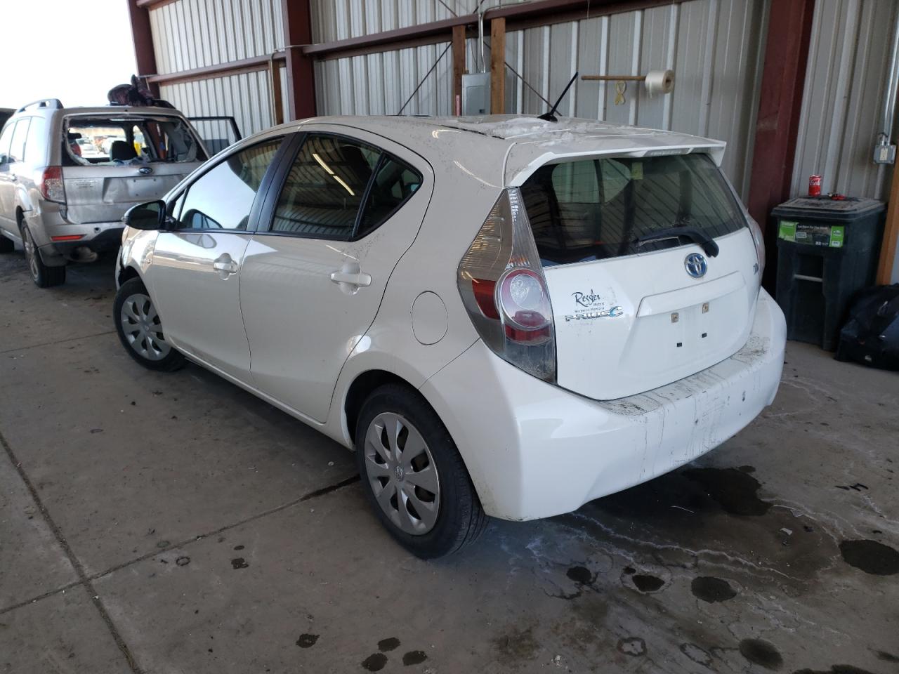 Photo 3 from auction – 2013 TOYOTA PRIUS C with VIN JTDKDTB3XD1541773