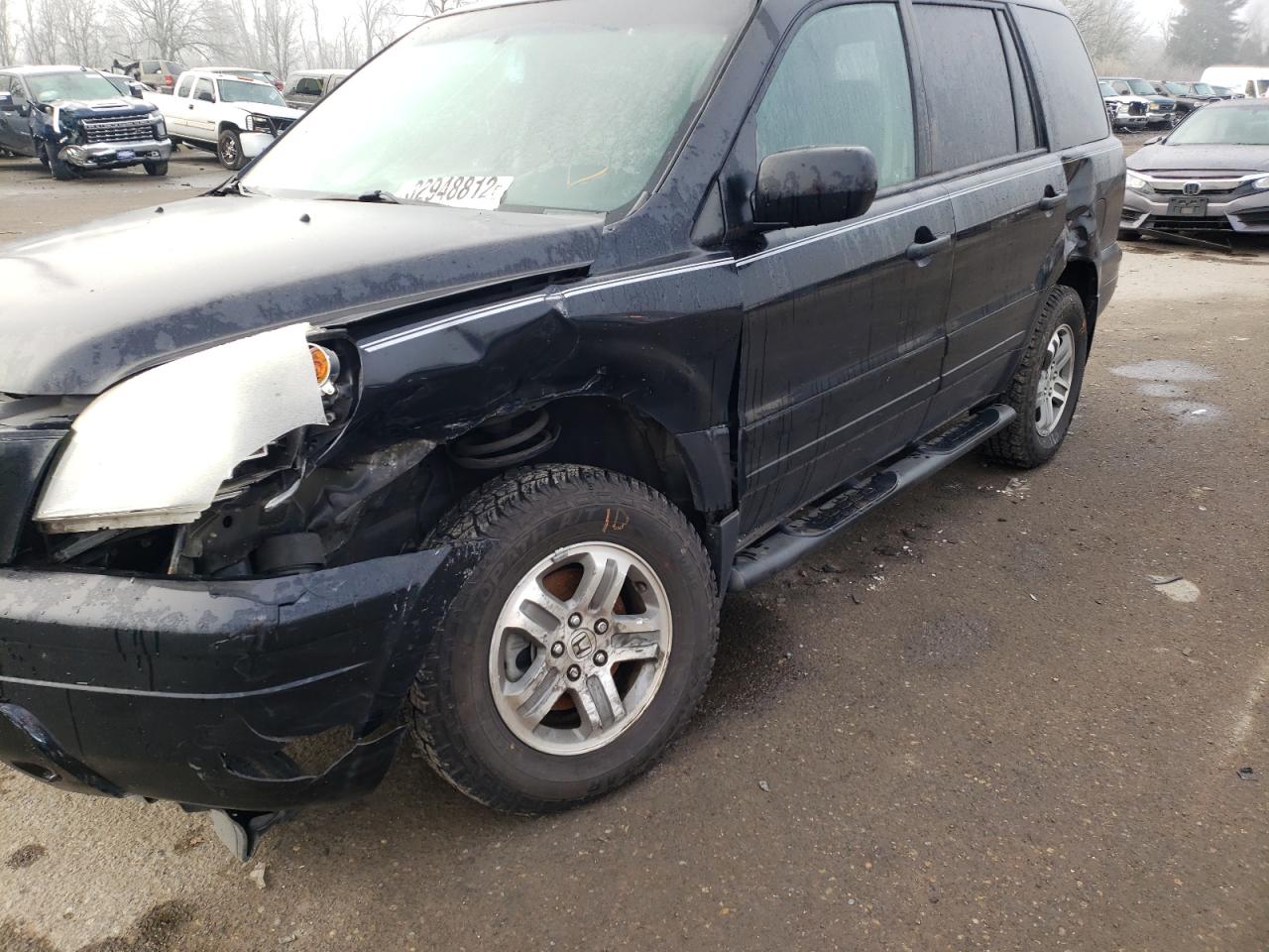Photo 9 from auction – 2004 HONDA PILOT EXL with VIN 2HKYF187X4H576227